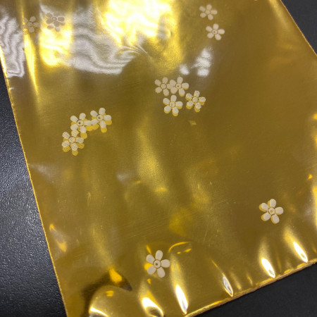 Пакет галографический желтый ромашки 10*20 см